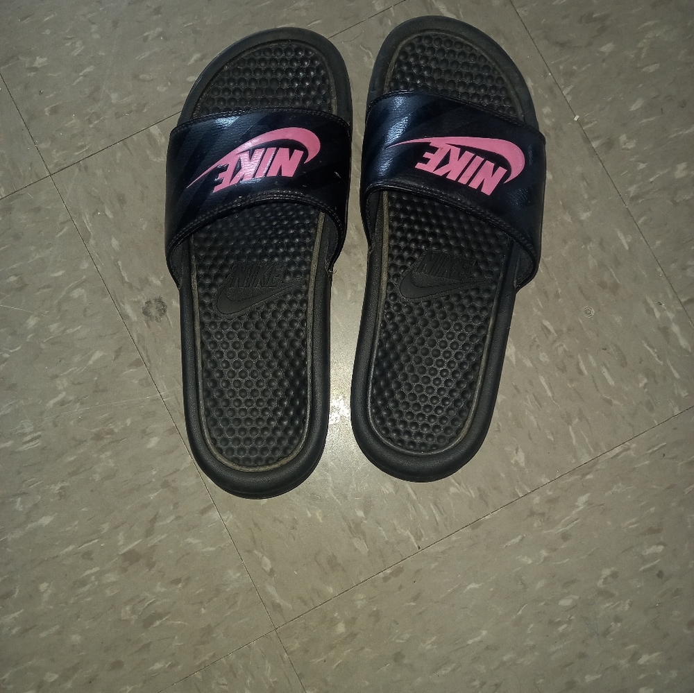 Pink and Black Nike slides